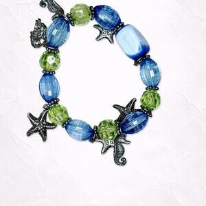 5571. Blue Plastic Stretch Bracelet
